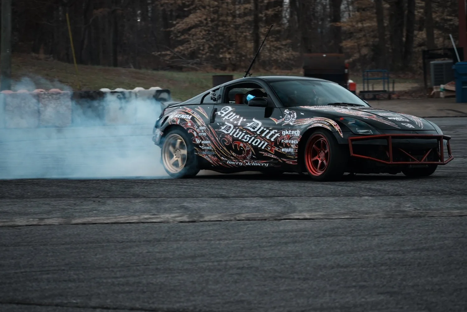 Drift car mid-slide during a track session