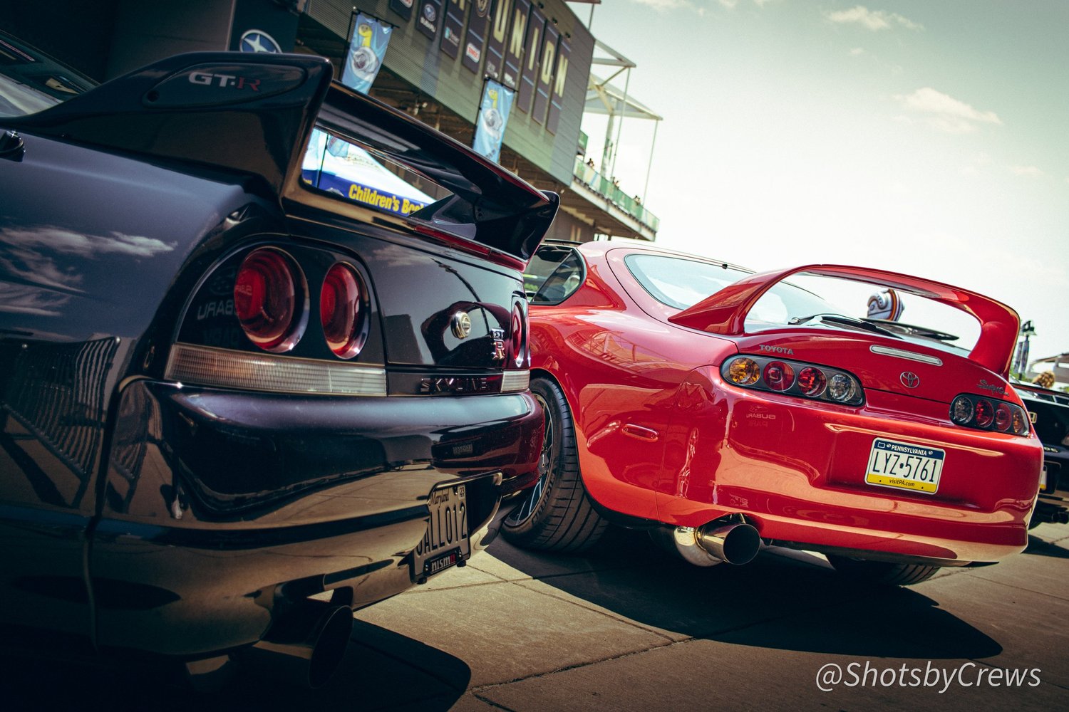 Two sports cars from an Apex Autoworks project